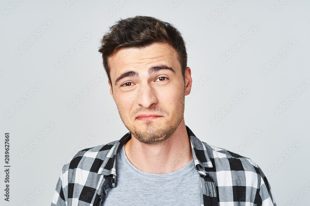 portrait of young man isolated on white background portrait of young man isolated on white background