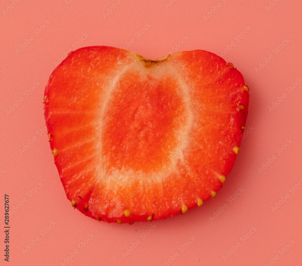 Red strawberries on a pink background Red strawberries on a pink background