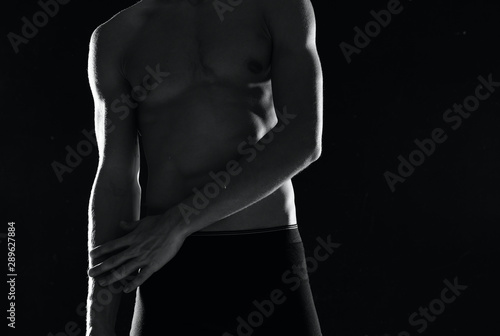 muscular man in black underwear