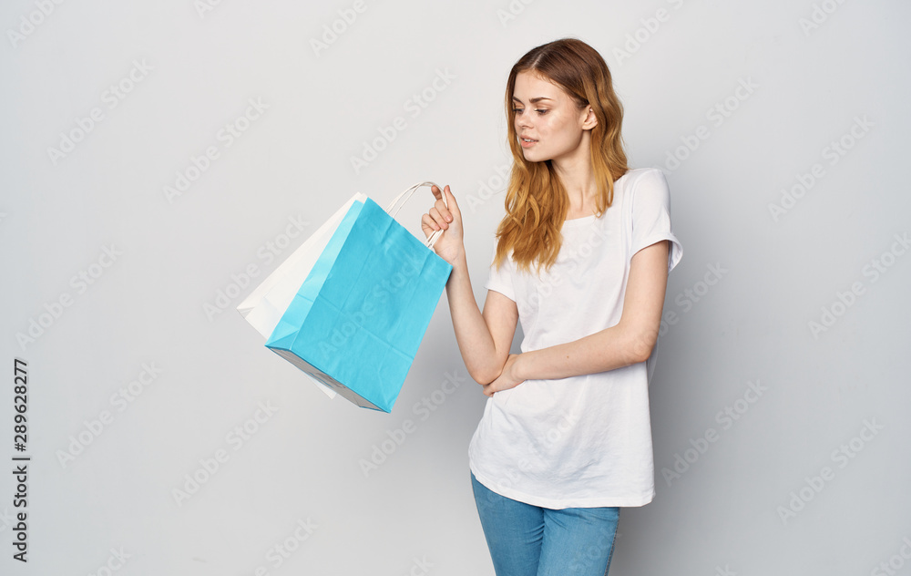 young woman with shopping bags young woman with shopping bags