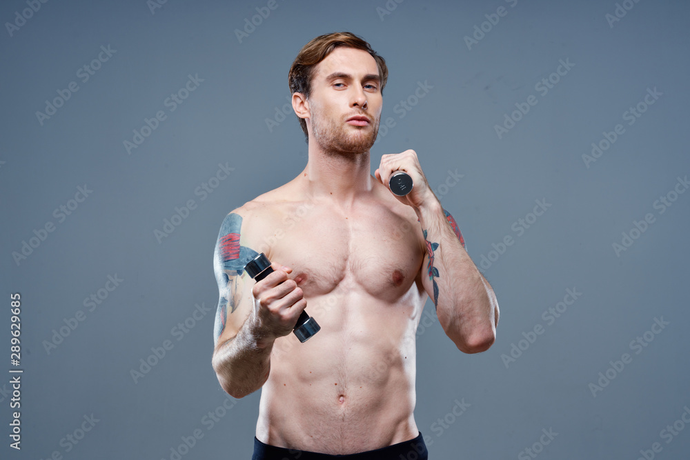 Fototapeta premium young man with arms raised