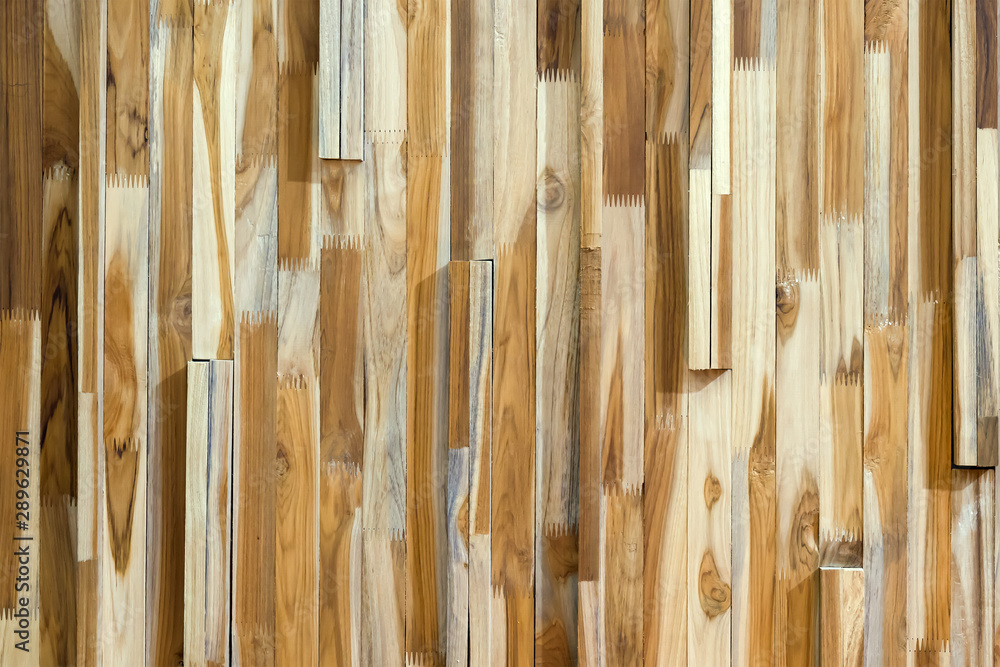 Fototapeta premium Decorative wall made of wood waste.