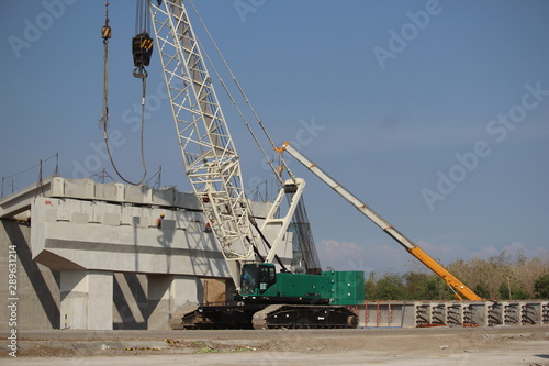 construction machinery is working on road projects and building structures