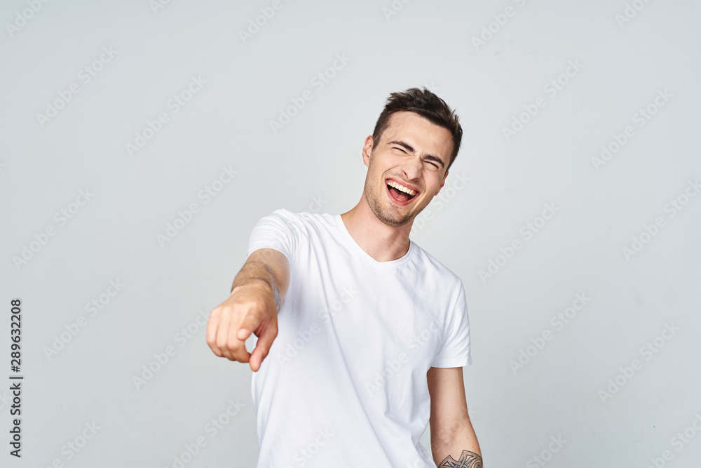 young man pointing at you young man pointing at you