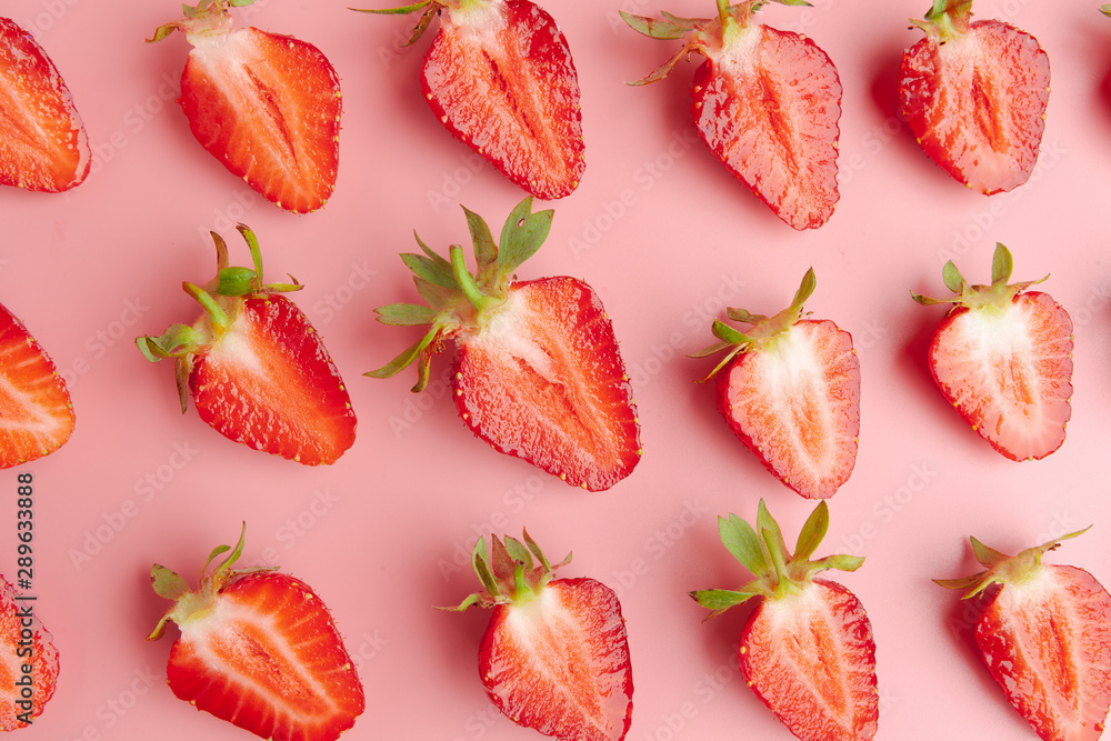 Strawberries on pink background. Fresh organic food concept Strawberries on pink background. Fresh organic food concept