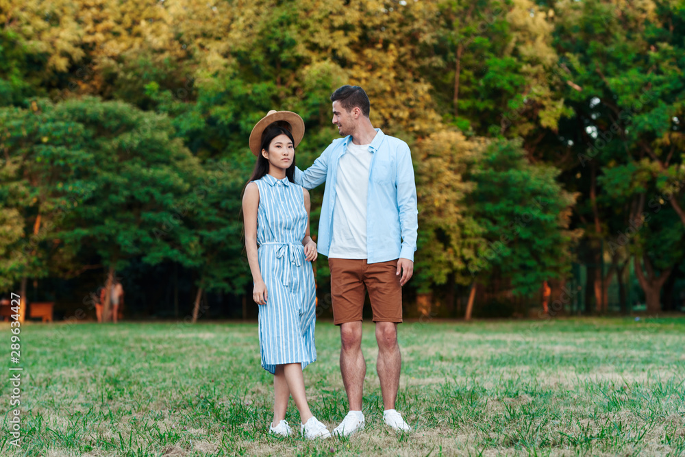 Fototapeta premium happy couple walking in the park