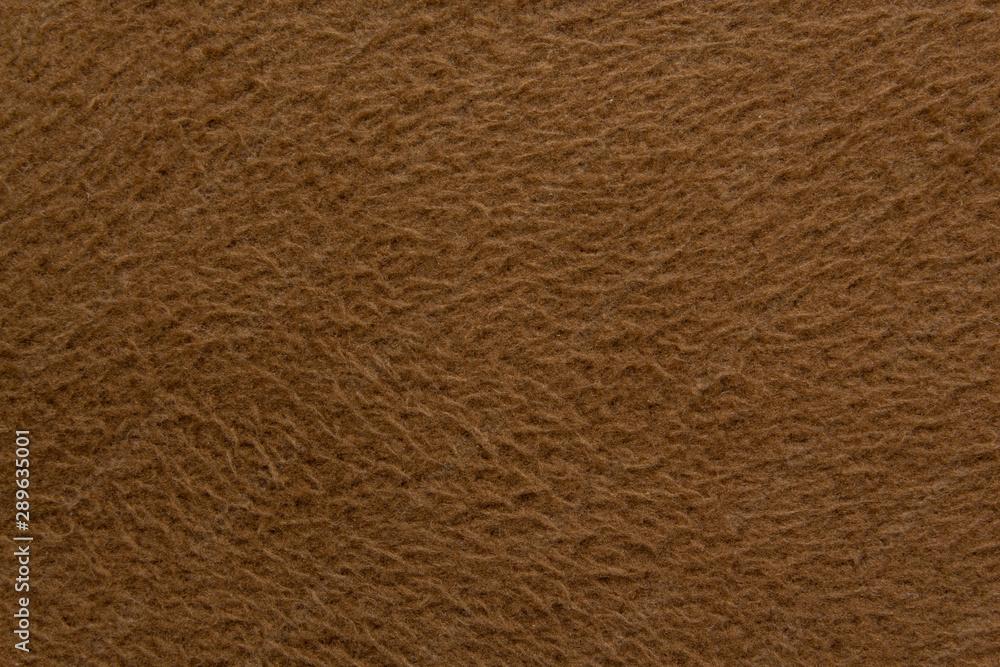 Texture of brown fleece fabric close up, fabric background Texture of brown fleece fabric close up, fabric background