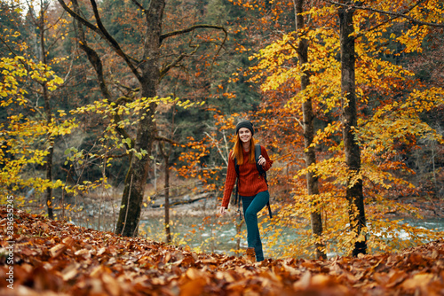 woman walking in autumn park