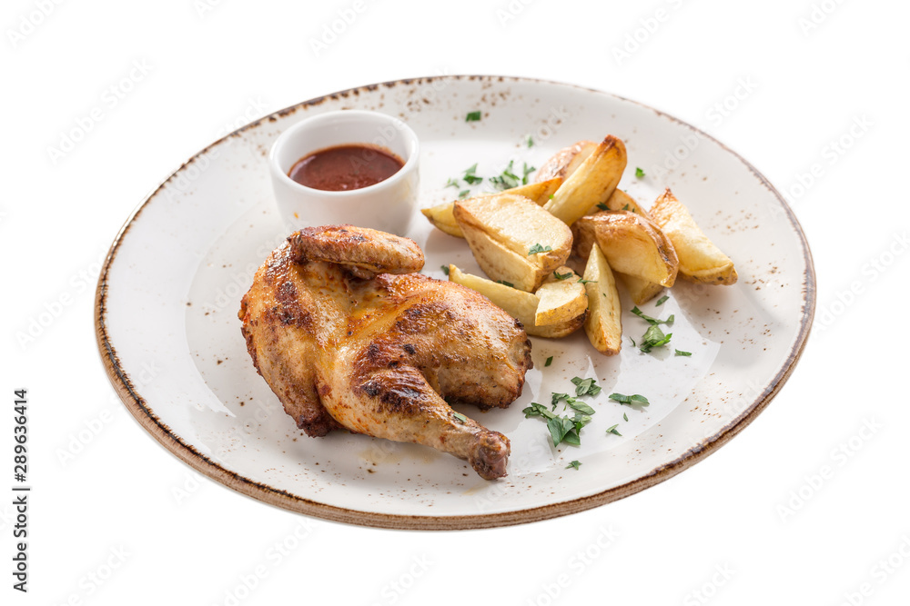 Half chicken tobacco with potato wedges and corn and tomato sauce isolated on white background Half chicken tobacco with potato wedges and corn and tomato sauce isolated on white background