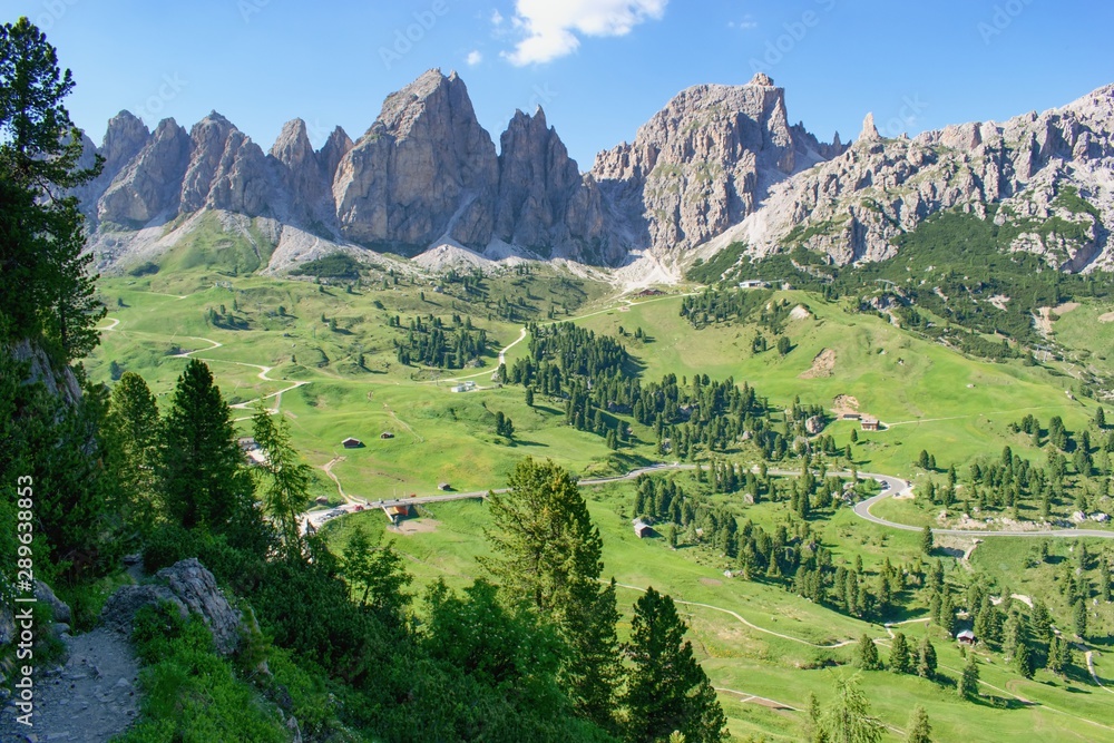 Beautiful summer mountain scenery with rocks  and green hills - Passo Gardena, Dolomites Italy.