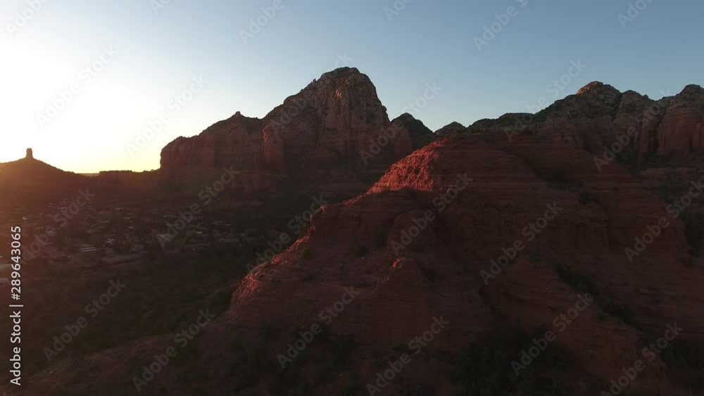 Aerial video of Coffee Pot Rock in Sedona, Arizona at sunset with lens flare Aerial video of Coffee Pot Rock in Sedona, Arizona at sunset with lens flare