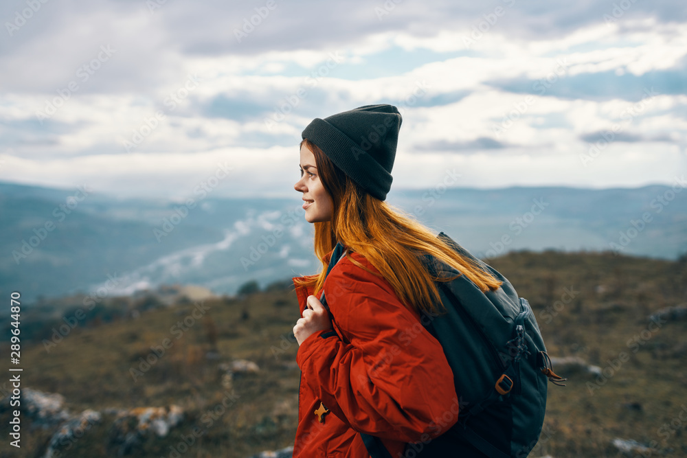 young woman in the mountains