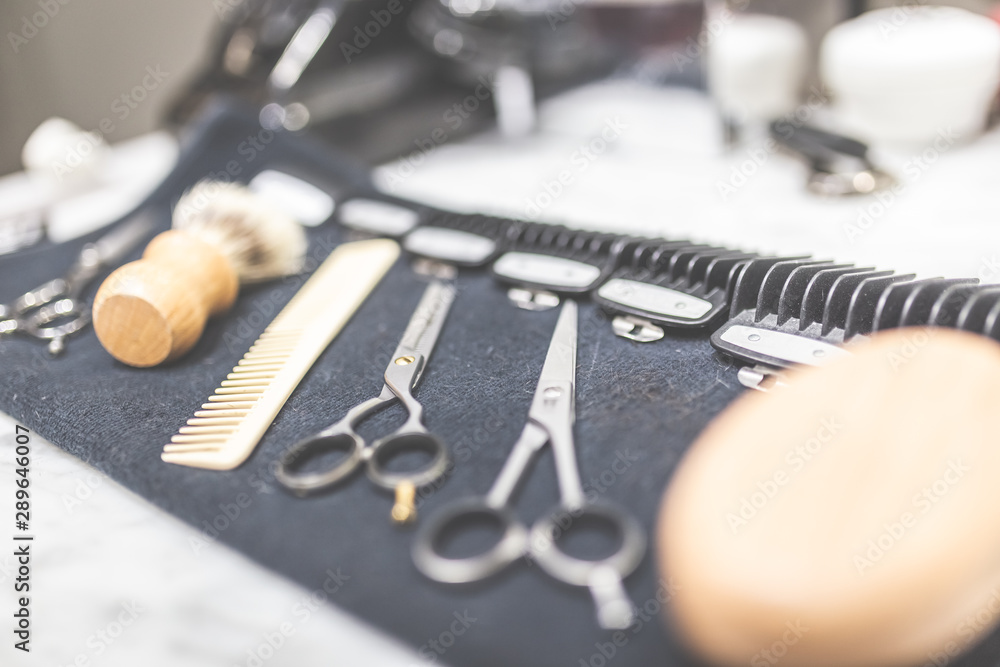 Shaving and barber equipment on towel at the desk. Shaving and barber equipment on towel at the desk.