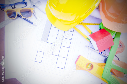 Architectural and engineer desk background construction project ideas concept, With drawing equipment