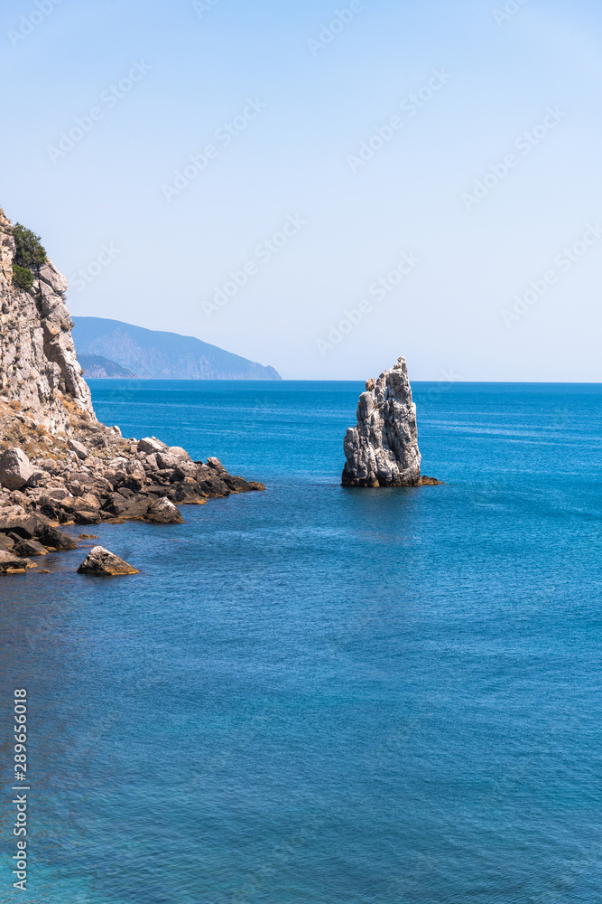 Seascape with a rock on the southern coast of Crimea