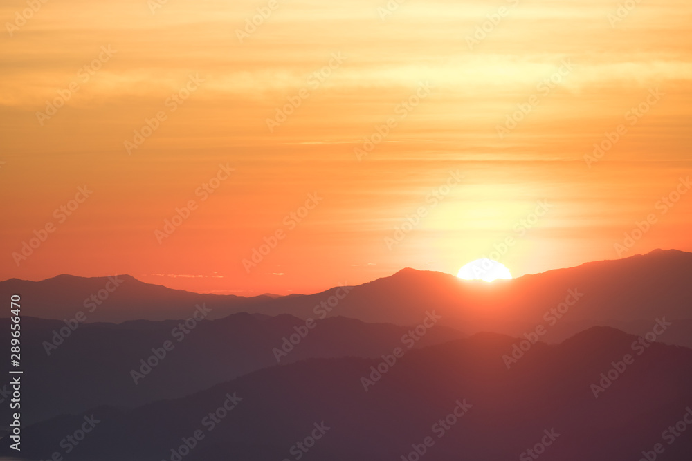 Fototapeta premium Dramatic sunset and sunrise over mountain morning twilight evening sky.