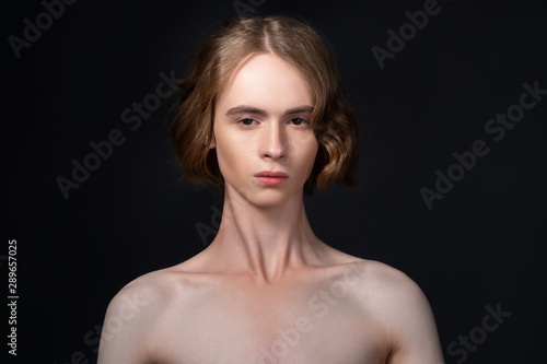 Portrait of a young attractive man. Androgyn model. photo