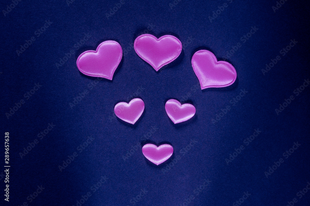 Decorative design for Valentine's Day. Hearts on a blue background.