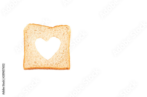 Love Concept. Bread slice with a shape of heart.