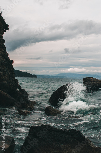 Vocation in Greece, Corfu. Water, cliff, mountains, and beautiful summer evening 
