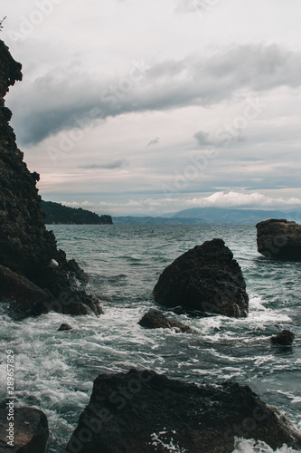 Vocation in Greece, Corfu. Water, cliff, mountains, and beautiful summer evening 