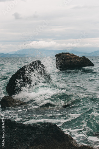 Vocation in Greece, Corfu. Water, cliff, mountains, and beautiful summer evening 