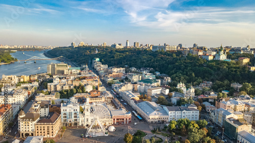 Wallpaper Mural Aerial top view of Kyiv cityscape, Dnieper river and Podol historical district skyline from above, Kontraktova square with ferris wheel, city of Kiev, Ukraine Torontodigital.ca
