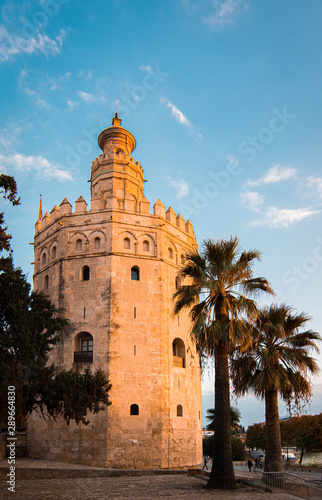 Torre del oro. Historic building in Seville. Spain. Teal and orange style