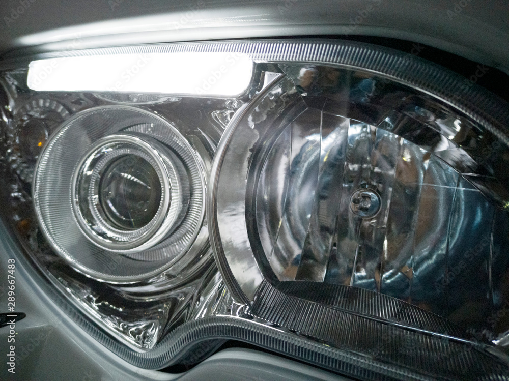 closeup of headlight of car