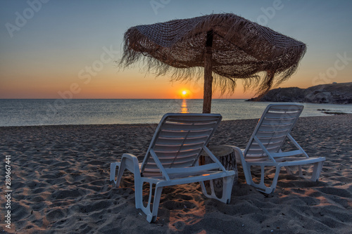 chairs and umbrella on the beach