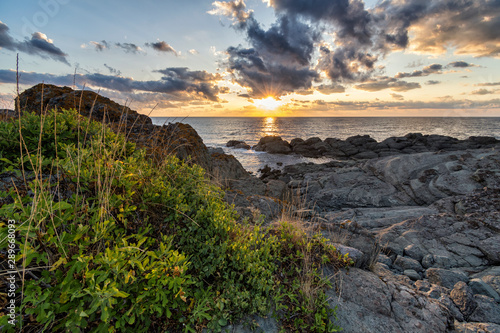 sunrise on coast of sea