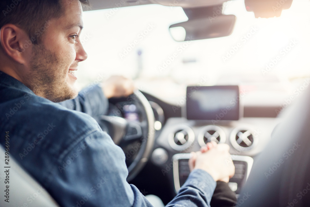 Picture of driver man and girl sitting in front seat of car. Picture of driver man and girl sitting in front seat of car.