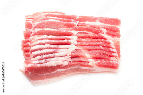 Several slices of raw bacon