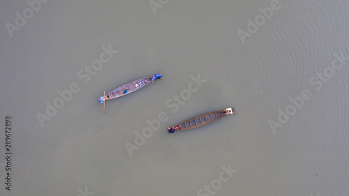 Aerial top view of Fishermen on a fishing boat in Thailand, View from above shot by drone