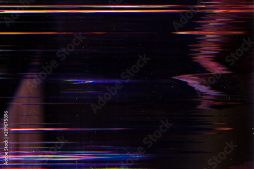 Display damage. Digital error. Glowing lines effect on dark background. photo