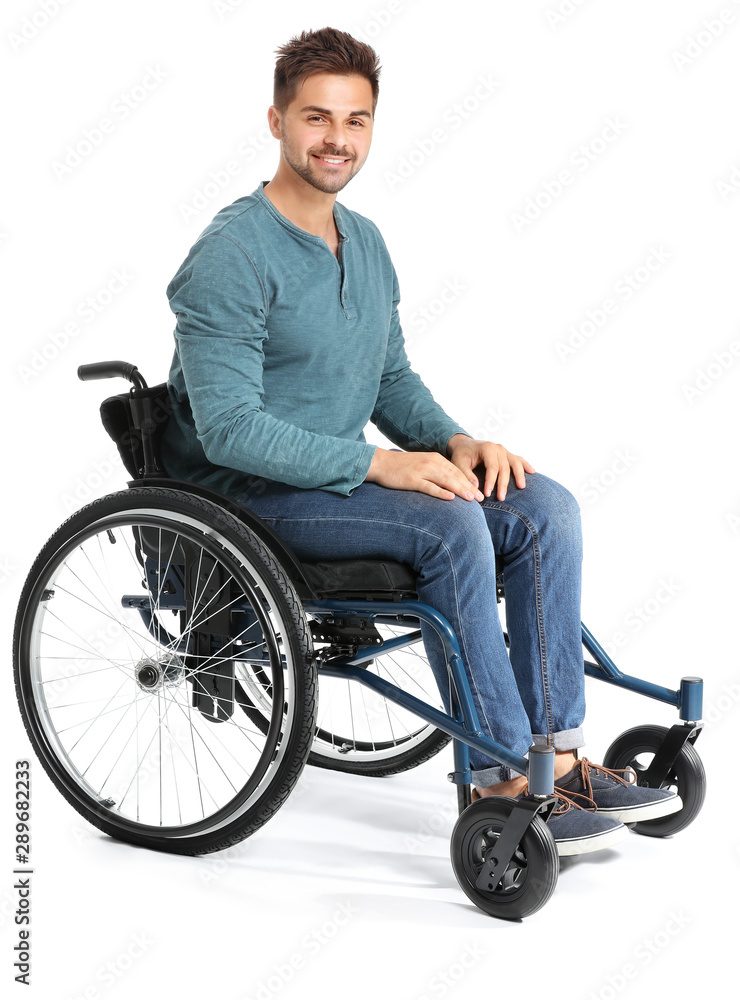 Handsome man in wheelchair on white background Handsome man in wheelchair on white background