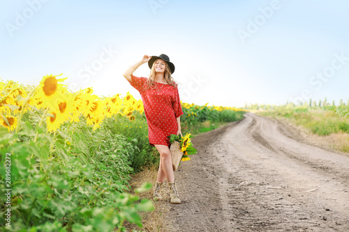 Beautiful young woman with ...