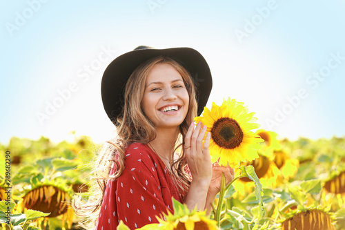 Beautiful young woman in su...