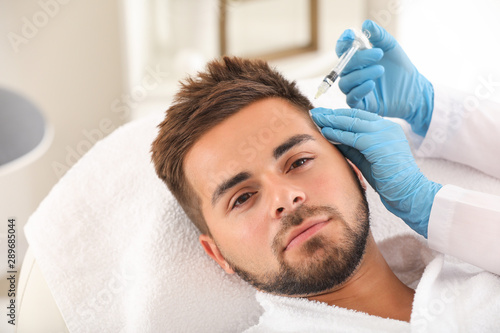 Man with hair loss problem ...