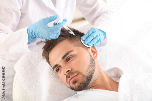 Man with hair loss problem ...
