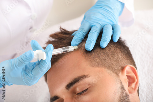 Man with hair loss problem ...