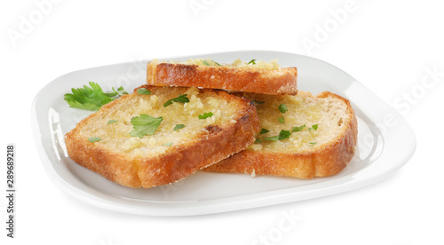Slices of toasted bread with garlic and herb on white background