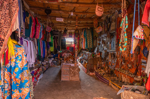 Streets in The fortified town of Ait ben Haddou near Ouarzazate on the edge of the sahara desert in Morocco. Atlas mountains. Street local ethnic market with goods and carpets