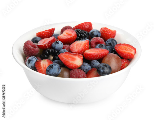 Fresh tasty fruit salad on white background