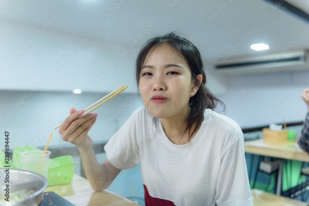 The girls are eating shabu,The girls enjoy eating shabu relaxing time food time The girls are eating shabu,The girls enjoy eating shabu relaxing time food time