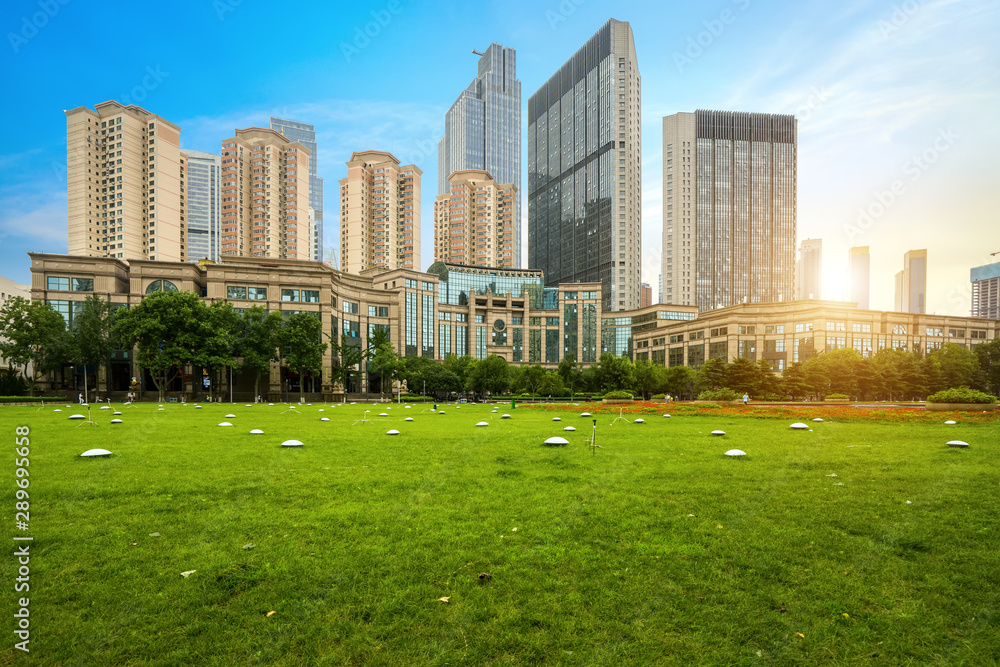 Obraz premium Park Lawn and Modern Urban Architecture in Qingdao, China