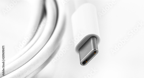 white USB Type-C charger cable on white background photo