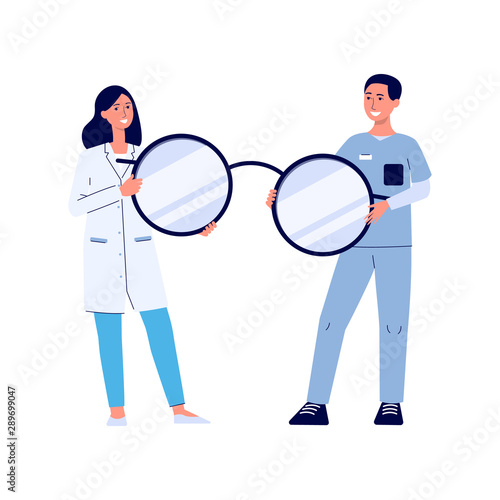 Eye doctor woman and male nurse holding a giant pair of glasses