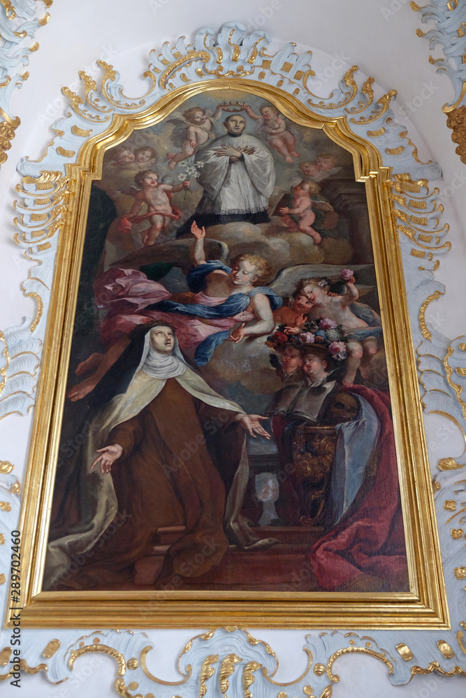 St. Mary Magdalene de Pazzi with St. Aloysius kneeling on a cloud, Saint Aloysius Gonzaga altar in Jesuit church of St. Francis Xavier in Lucerne, Switzerland