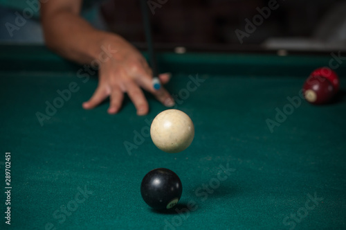 Wallpaper Mural Billiards balls and cue on billiards table. Billiard sport concept Torontodigital.ca